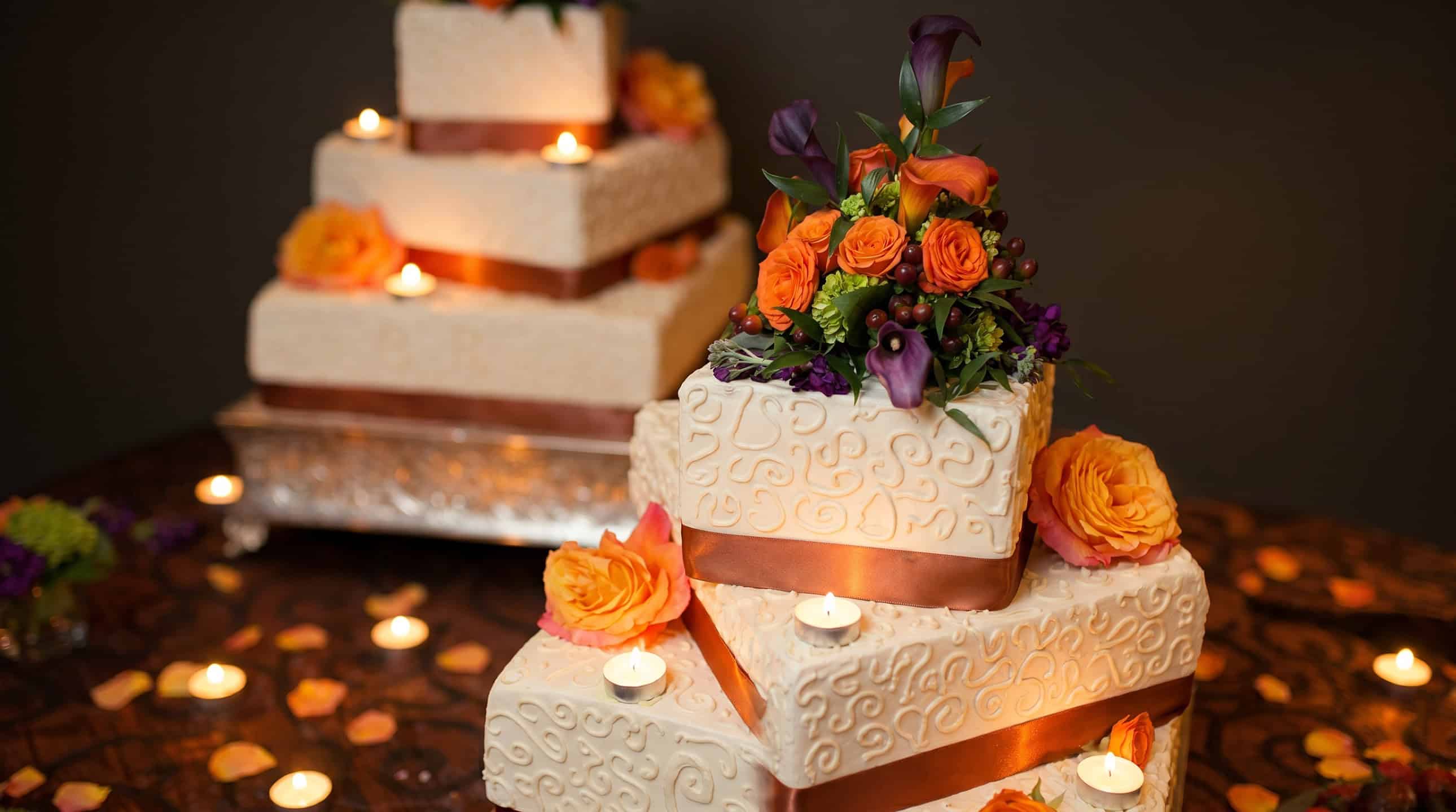 A beautifully decorated tiered wedding cake by Nan's Nummies